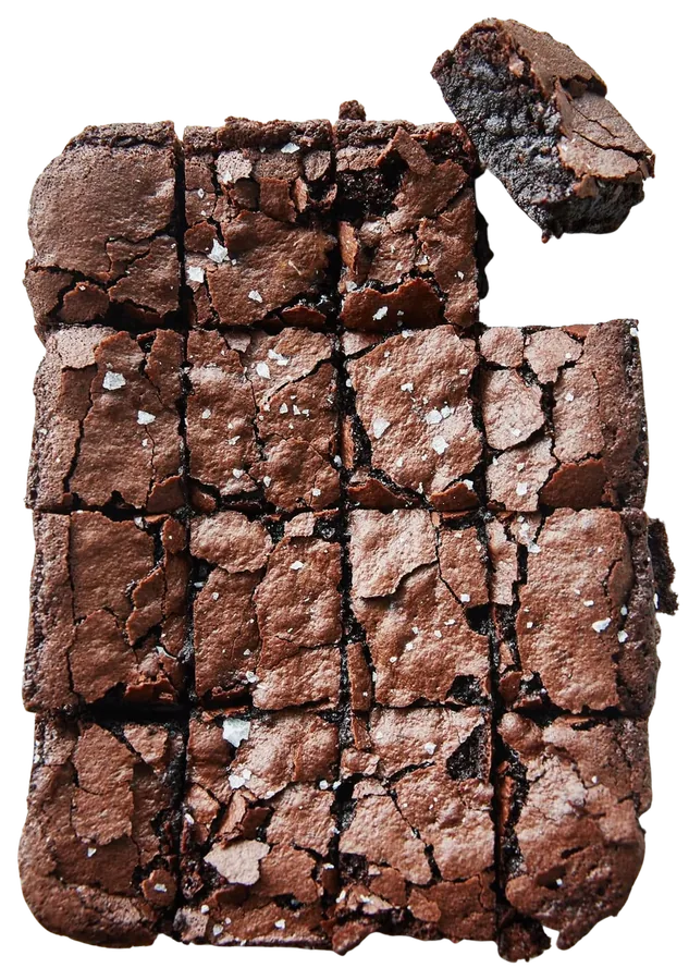 Slab of fudgy sourdough brownies with flaky sea salt, cut into squares